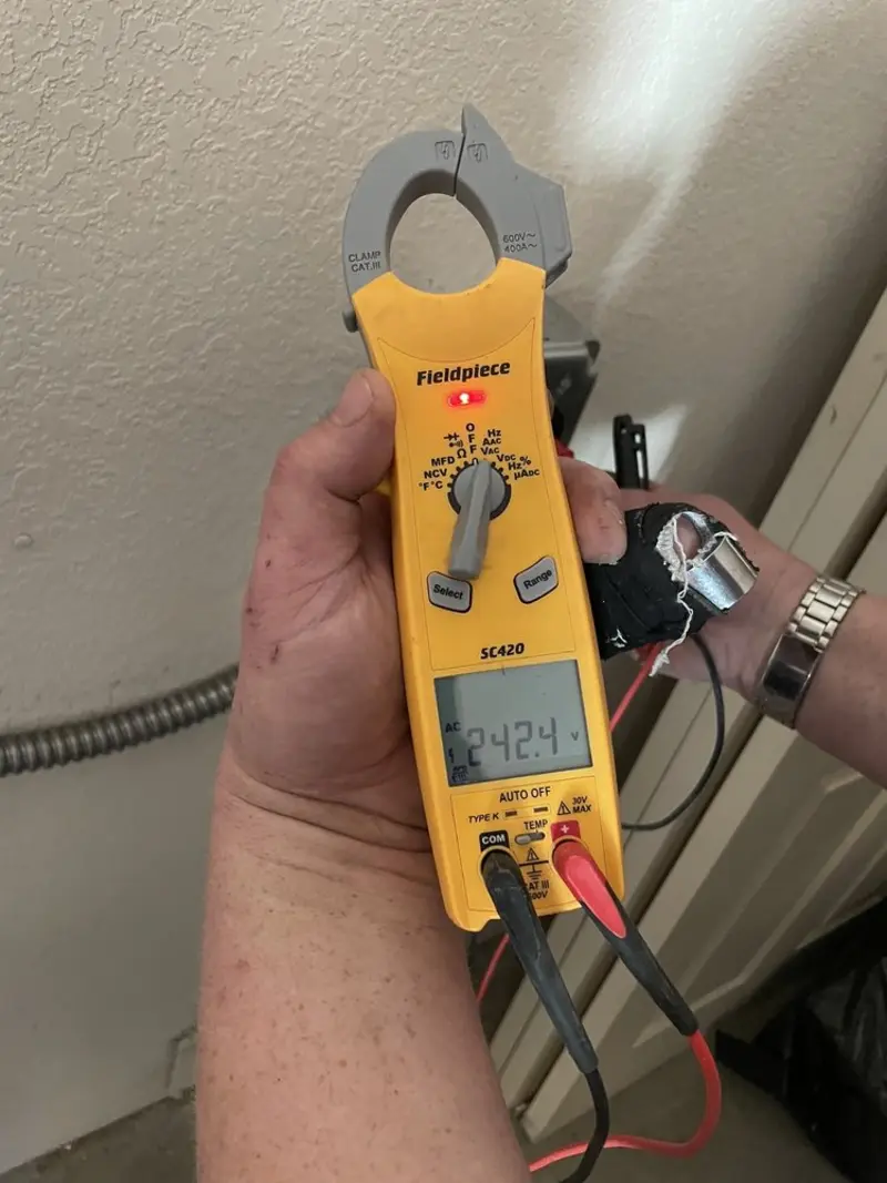 Voltage testing with clamp meter during Generator Installation in Natick